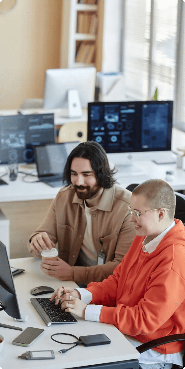 G-tech young female it manager her male colleague with cup coffee 1